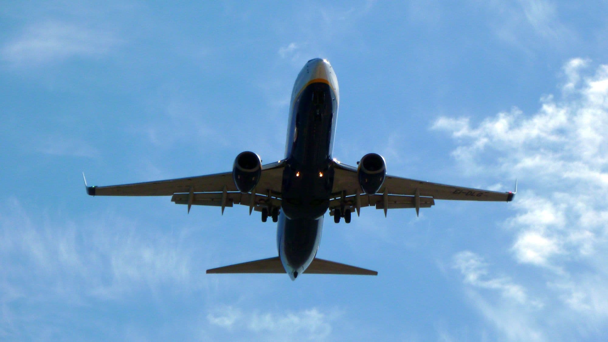 A jet aircraft in flight against a blue sky